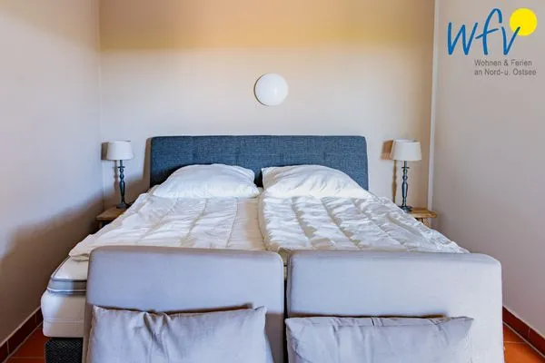 Schlafzimmer Ferienhaus am Gutspark Dranske Ferienwohnung Sonnengarten