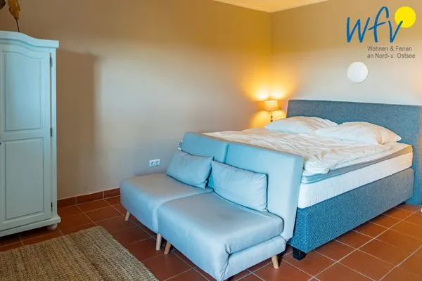 Schlafzimmer Ferienhaus am Gutspark Dranske Ferienwohnung Sonnengarten