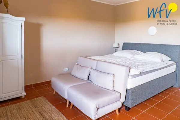 Schlafzimmer Ferienhaus am Gutspark Dranske Ferienwohnung Sonnengarten