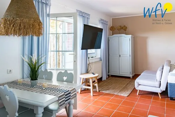 Wohnzimmer Ferienhaus am Gutspark Dranske Ferienwohnung Sonnengarten