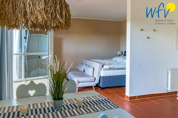 Wohnzimmer Ferienhaus am Gutspark Dranske Ferienwohnung Sonnengarten