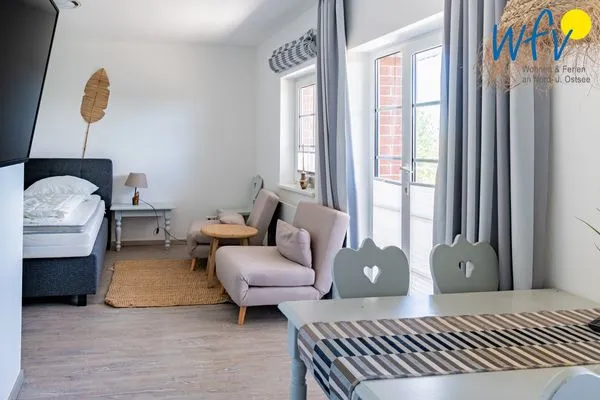 Schlafzimmer Ferienhaus am Gutspark Dranske Ferienwohnung Sonnenaufgang