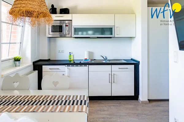 Küche / Küchenzeile Ferienhaus am Gutspark Dranske Ferienwohnung Sonnenaufgang