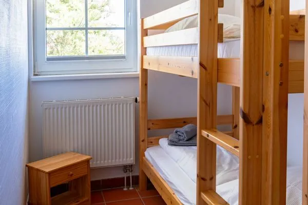 Schlafzimmer Ferienhaus am Gutspark Dranske Ferienwohnung Sonnenkuss