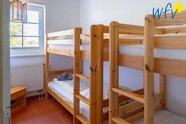 Schlafzimmer Ferienhaus am Gutspark Dranske Ferienwohnung Sonnenkuss