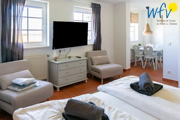 Schlafzimmer Ferienhaus am Gutspark Dranske Ferienwohnung Sonnenhut