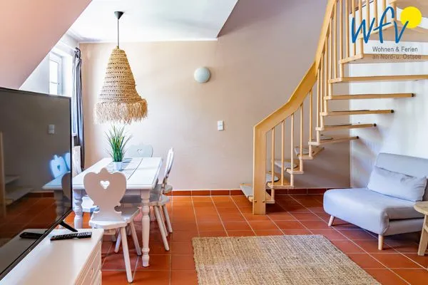 Wohnzimmer Ferienhaus am Gutspark Dranske Ferienwohnung Sonnenstrahl