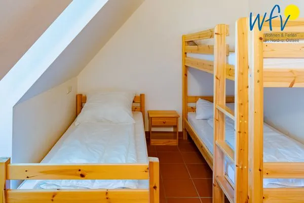 Schlafzimmer Ferienhaus am Gutspark Dranske Ferienwohnung Sonnenliebe