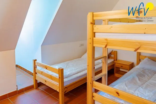 Schlafzimmer Ferienhaus am Gutspark Dranske Ferienwohnung Sonnenliebe