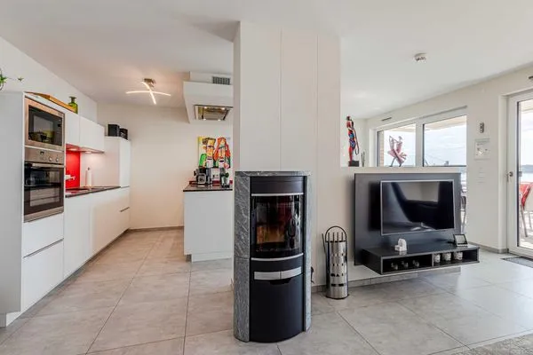 Ferienwohnung Müritzoase Hafenresidenz Waren (Müritz) - Wohnzimmer mit Kamin  Müritzoase