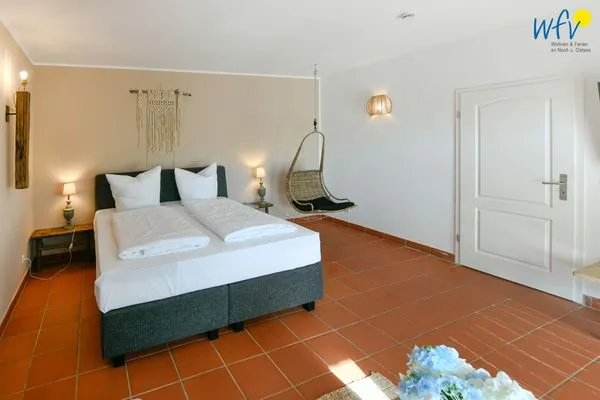 Schlafzimmer Ferienhaus am Gutspark Dranske Ferienwohnung Strandhafer
