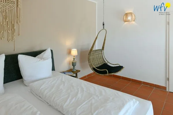 Schlafzimmer Ferienhaus am Gutspark Dranske Ferienwohnung Strandhafer