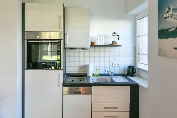 Küche / Küchenzeile Ferienhaus am Gutspark Dranske Ferienwohnung Silbergras