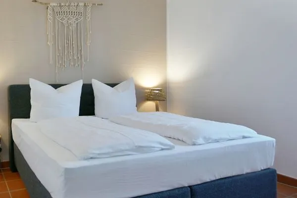 Schlafzimmer Ferienhaus am Gutspark Dranske Ferienwohnung Silbergras