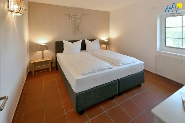 Schlafzimmer Ferienhaus am Gutspark Dranske Ferienwohnung Silbergras