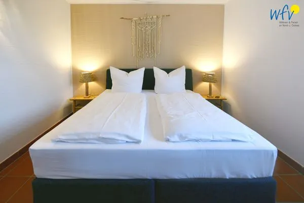 Schlafzimmer Ferienhaus am Gutspark Dranske Ferienwohnung Silbergras