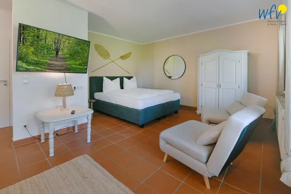 Schlafzimmer Ferienhaus am Gutspark Dranske Ferienwohnung Heiderose