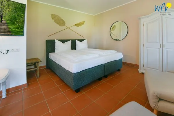 Schlafzimmer Ferienhaus am Gutspark Dranske Ferienwohnung Heiderose