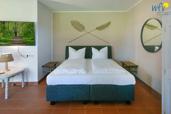 Schlafzimmer Ferienhaus am Gutspark Dranske Ferienwohnung Heiderose