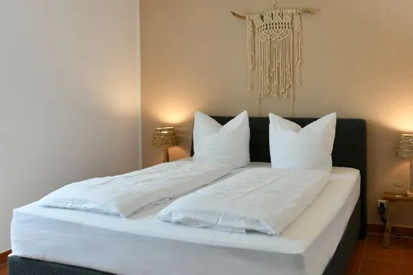 Schlafzimmer Ferienhaus am Gutspark Dranske Ferienwohnung Strandroggen