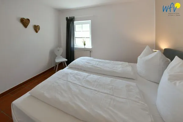 Schlafzimmer Ferienhaus am Gutspark Dranske Ferienwohnung Strandroggen