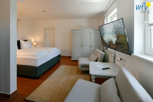 Schlafzimmer Ferienhaus am Gutspark Dranske Ferienwohnung Strandflieder