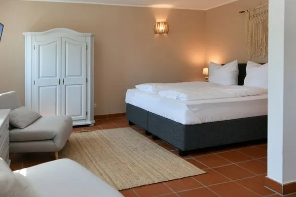 Schlafzimmer Ferienhaus am Gutspark Dranske Ferienwohnung Sandglöckchen