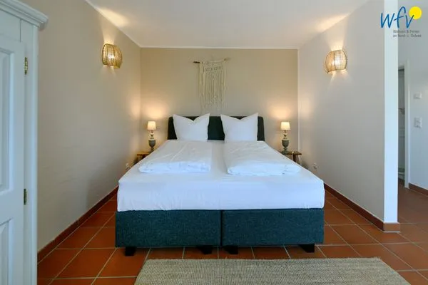 Schlafzimmer Ferienhaus am Gutspark Dranske Ferienwohnung Sandglöckchen