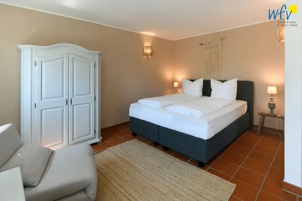 Schlafzimmer Ferienhaus am Gutspark Dranske Ferienwohnung Sandglöckchen