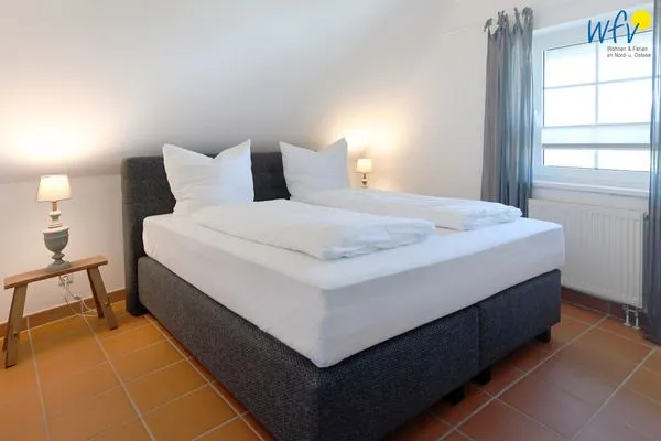 Schlafzimmer Ferienhaus am Gutspark Dranske Ferienwohnung Küstenklee