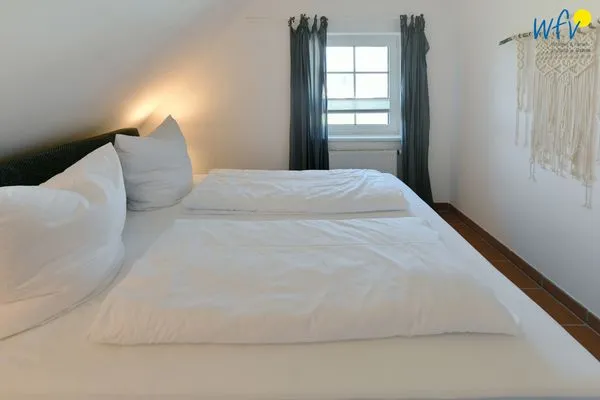 Schlafzimmer Ferienhaus am Gutspark Dranske Ferienwohnung Küstenklee