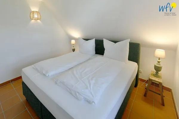 Schlafzimmer Ferienhaus am Gutspark Dranske Ferienwohnung Küstenklee