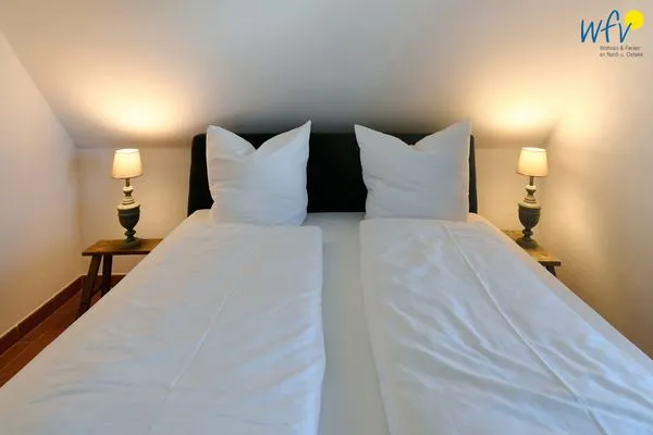 Schlafzimmer Ferienhaus am Gutspark Dranske Ferienwohnung Küstenklee