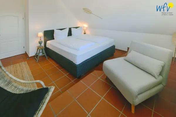 Schlafzimmer Ferienhaus am Gutspark Dranske Ferienwohnung Sonnendistel