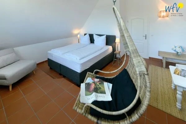 Schlafzimmer Ferienhaus am Gutspark Dranske Ferienwohnung Seegras