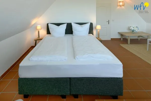 Schlafzimmer Ferienhaus am Gutspark Dranske Ferienwohnung Seegras