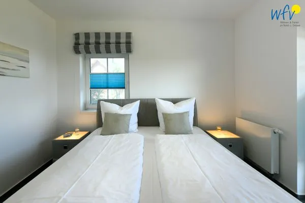 Schlafzimmer Ferienhaus am Gutspark Dranske Ferienwohnung Sonnentag