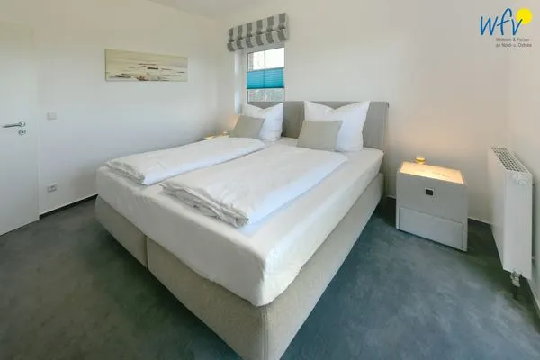 Schlafzimmer Ferienhaus am Gutspark Dranske Ferienwohnung Sonnentag