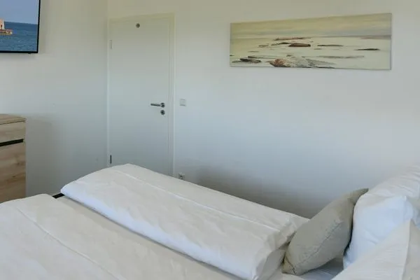 Schlafzimmer Ferienhaus am Gutspark Dranske Ferienwohnung Sonnentag