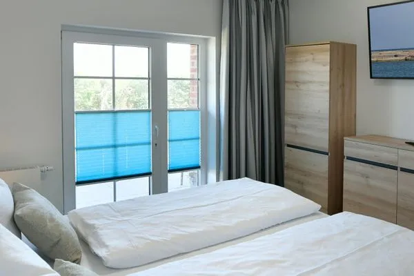 Schlafzimmer Ferienhaus am Gutspark Dranske Ferienwohnung Sonnentag