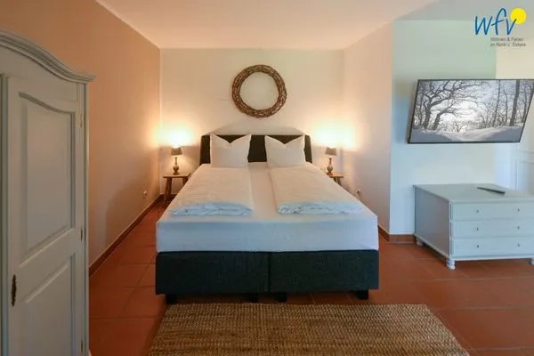 Schlafzimmer Ferienhaus am Gutspark Dranske Ferienwohnung Sonnenschein