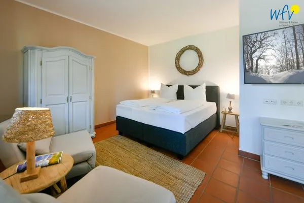 Schlafzimmer Ferienhaus am Gutspark Dranske Ferienwohnung Sonnenschein