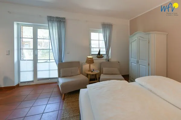 Schlafzimmer Ferienhaus am Gutspark Dranske Ferienwohnung Sonnenschein