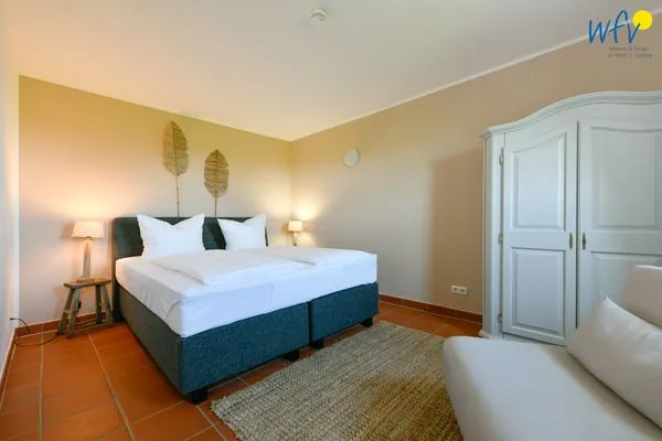 Schlafzimmer Ferienhaus am Gutspark Dranske Ferienwohnung Sonnenhut