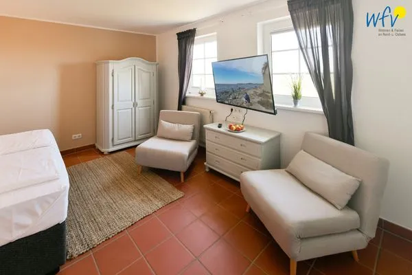 Schlafzimmer Ferienhaus am Gutspark Dranske Ferienwohnung Sonnenhut