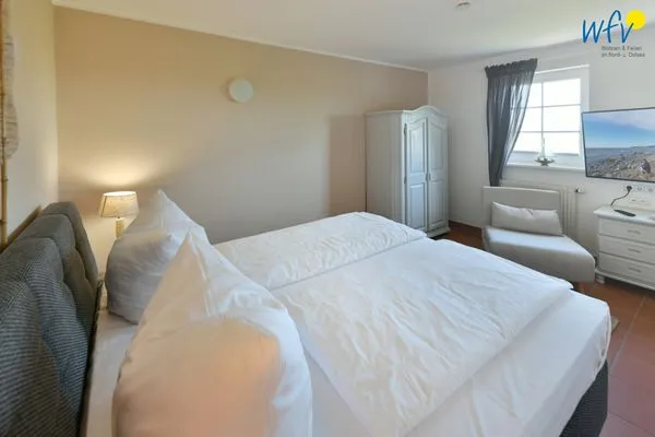 Schlafzimmer Ferienhaus am Gutspark Dranske Ferienwohnung Sonnenhut