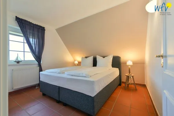 Schlafzimmer Ferienhaus am Gutspark Dranske Ferienwohnung Sonnenrose