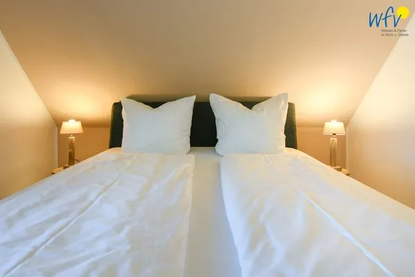 Schlafzimmer Ferienhaus am Gutspark Dranske Ferienwohnung Sonnenrose