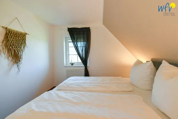 Schlafzimmer Ferienhaus am Gutspark Dranske Ferienwohnung Sonnenrose