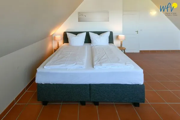 Schlafzimmer Ferienhaus am Gutspark Dranske Ferienwohnung Sonnenstrahl